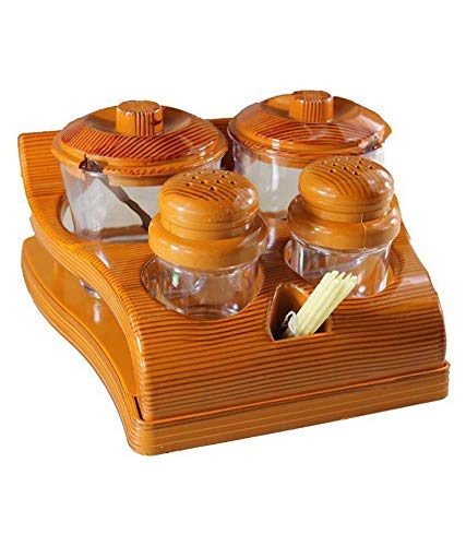 Vrct Plastic Dining Set Brown, Two Pickle/Sugar Pot, Three Spoon and 2 salt and pepper dispenser placed on a well designed way a