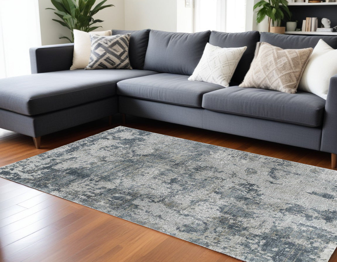 9 X 12 Blue and Gray Abstract Power Loom Distressed Area Rug