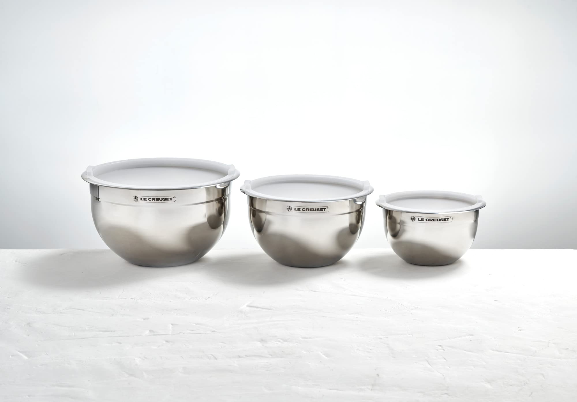 Le Creuset Set Of 3 Nested Mixing Bowls W/Nonslip Silicone Base & Plastic Air Tight Lids, Large, Stainless Steel