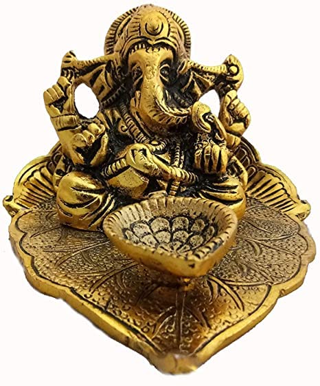 Heaven Decor Leaf Ganesh God Idol Decorative Murti With Diya Decorative Showpiece For Car And Home Temple