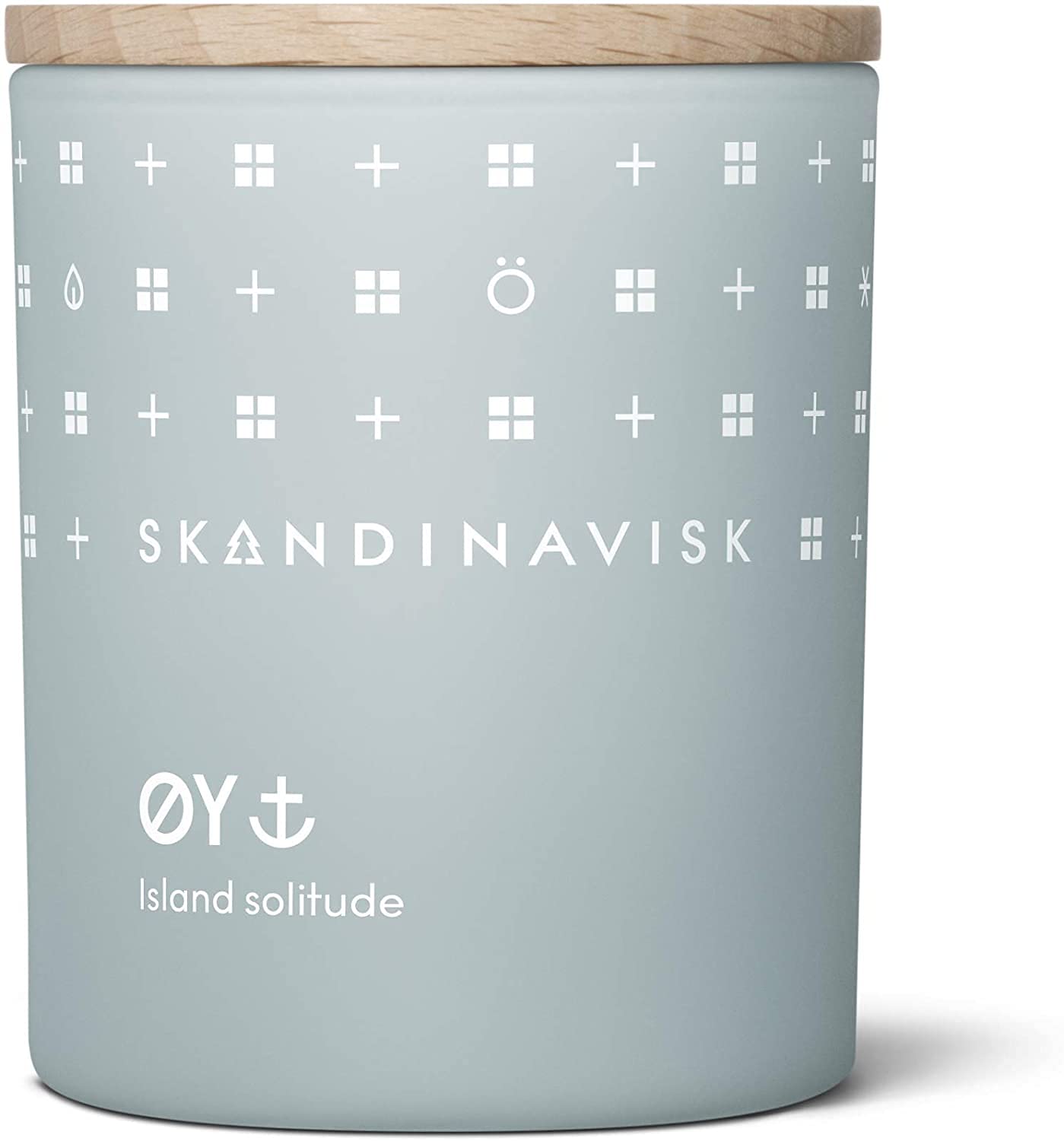 Skandinavisk Y Island Mini Scented Candle. Fragrance Notes: Crabapple and Dog Rose, Water Mosses and Green Leaves. 2.3 oz.