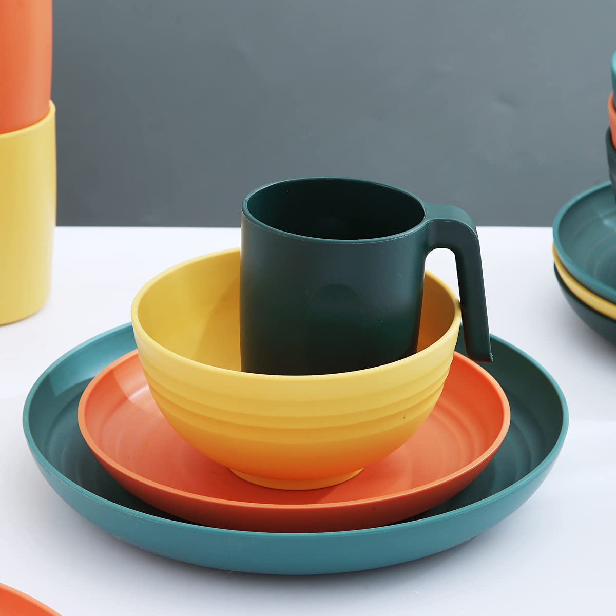 Kyraton Plastic Dinnerware Set of 16 Pieces  Unbreakable And Reusable Light Weight Plates Mugs Bowls Dishes Easy to Carry And Clean Microwave Safe BPA Free Dishwasher Safe Service For 4 (Mutil Color)