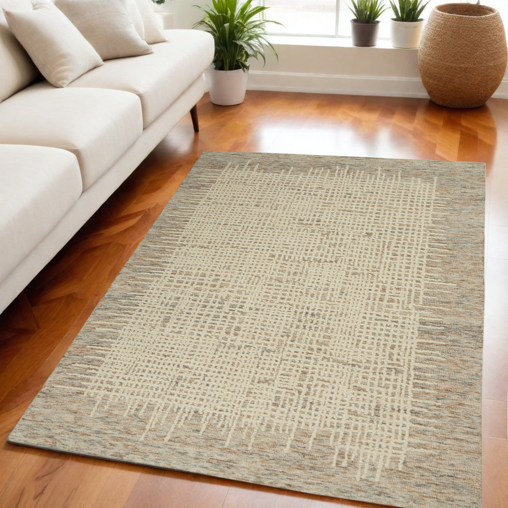 5 X 7 Beige and Tan Wool Abstract Area Rug