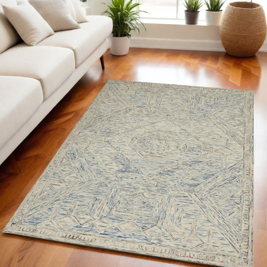 5 X 8 Tan and Blue Wool Geometric Area Rug