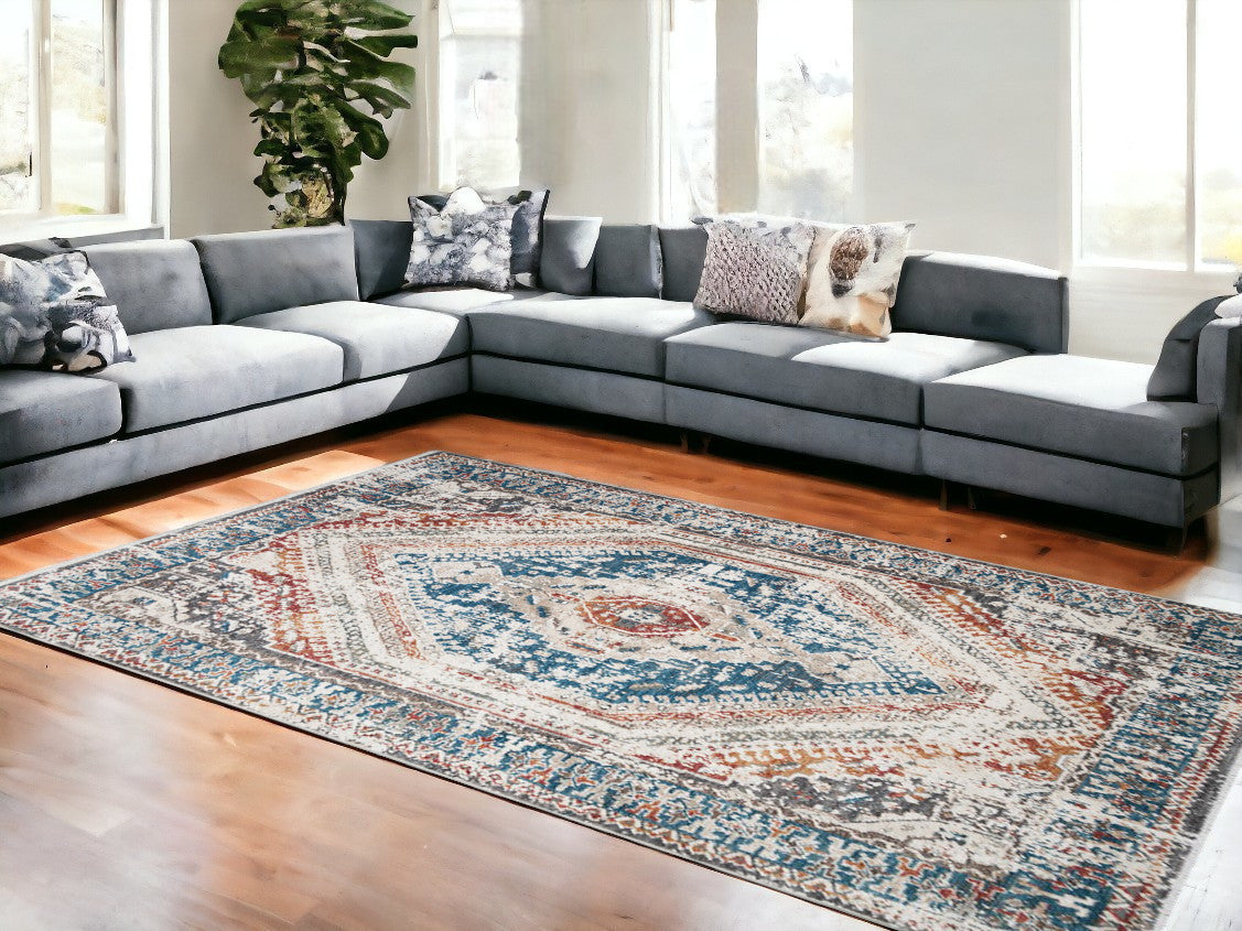8 X 10 Teal Taupe and Rust Geometric Distressed Area Rug With Fringe