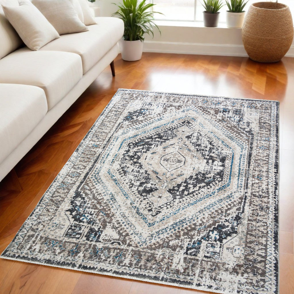 5 X 8 Gray Beige and Blue Geometric Distressed Area Rug With Fringe