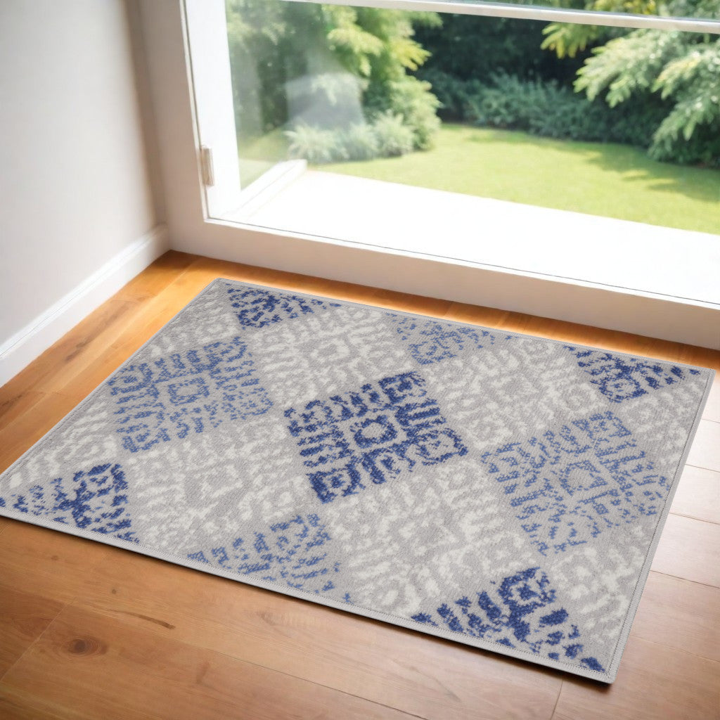 2 X 3 Beige Blue and Gray Geometric Area Rug