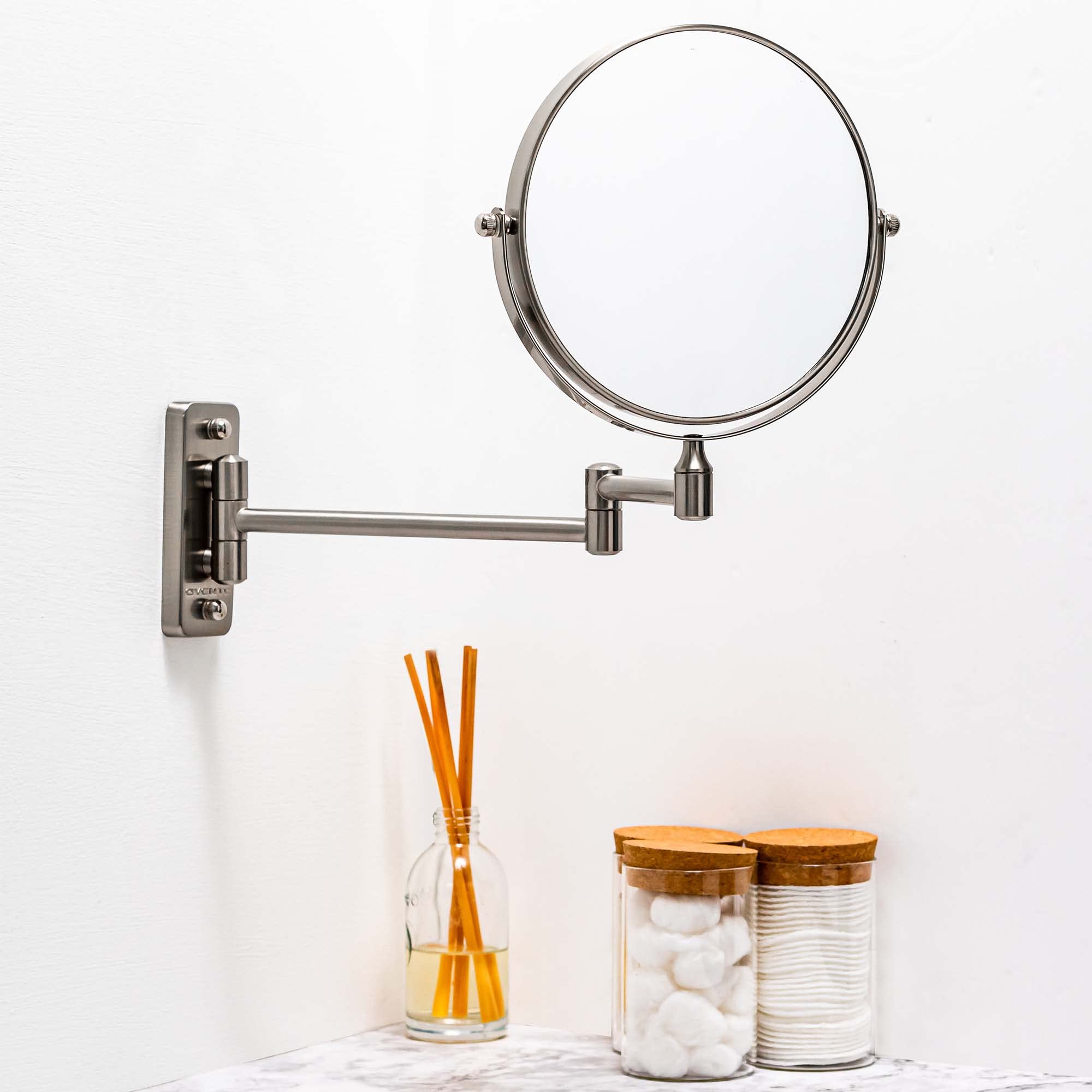 Ovente 7'' Wall Mounted Makeup Mirror - 1X/ 7X Magnification, Rotating 360-Degree, Double-Sided, Extendable & Folding Arm, Clear