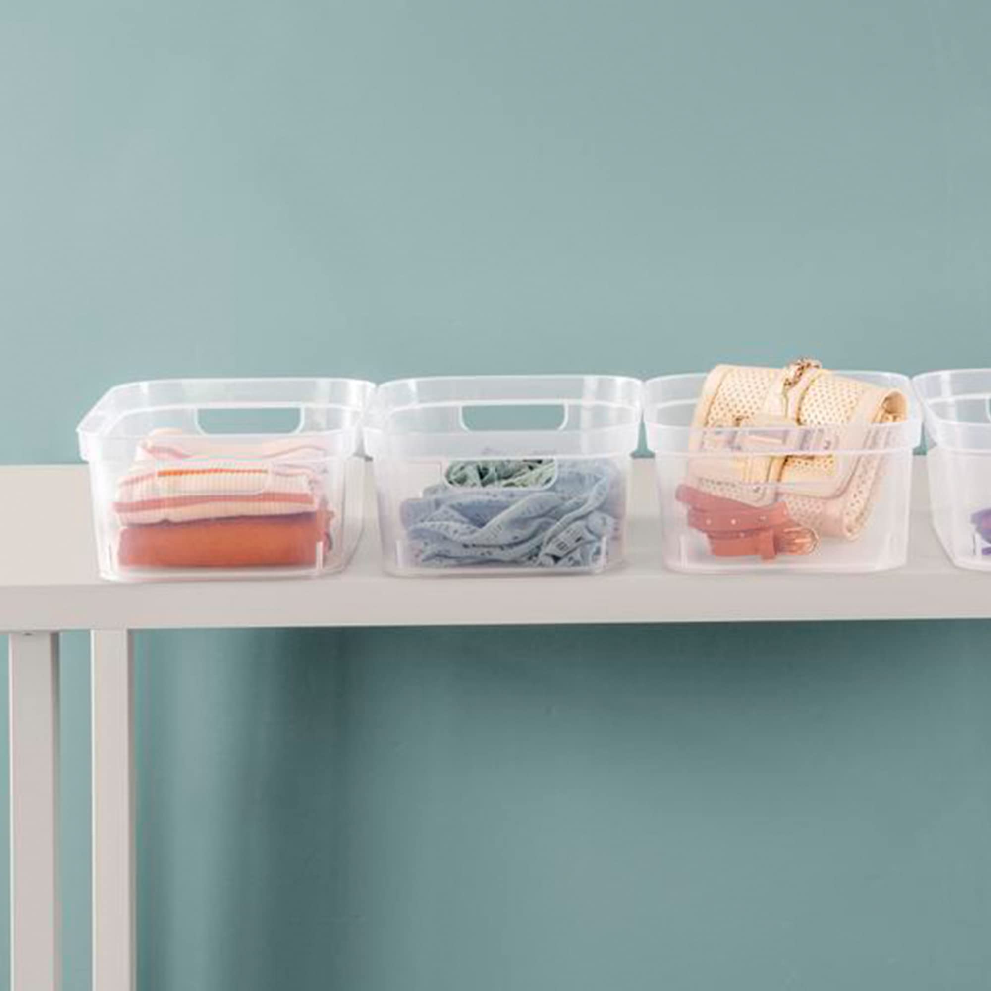 Sterilite 4.25 x 8 x 12.25 Inch Small Modern Storage Bin with Comfortable Carry Through Handles and Banded Rim for Household Organization  Clear