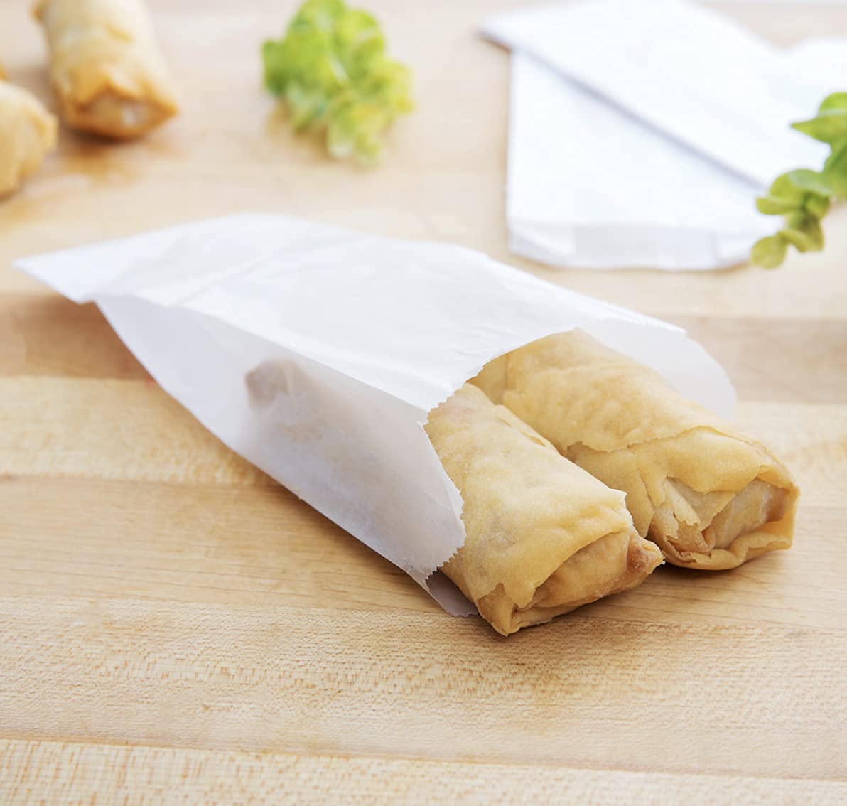 Small Glassine Treat Bags (200 ct) for Egg Rolls  Spring Rolls  Fortune Cookies  Cookies  Brownie Bites  and more. Grease-resistant and small take-out or to-go snacks and treats.