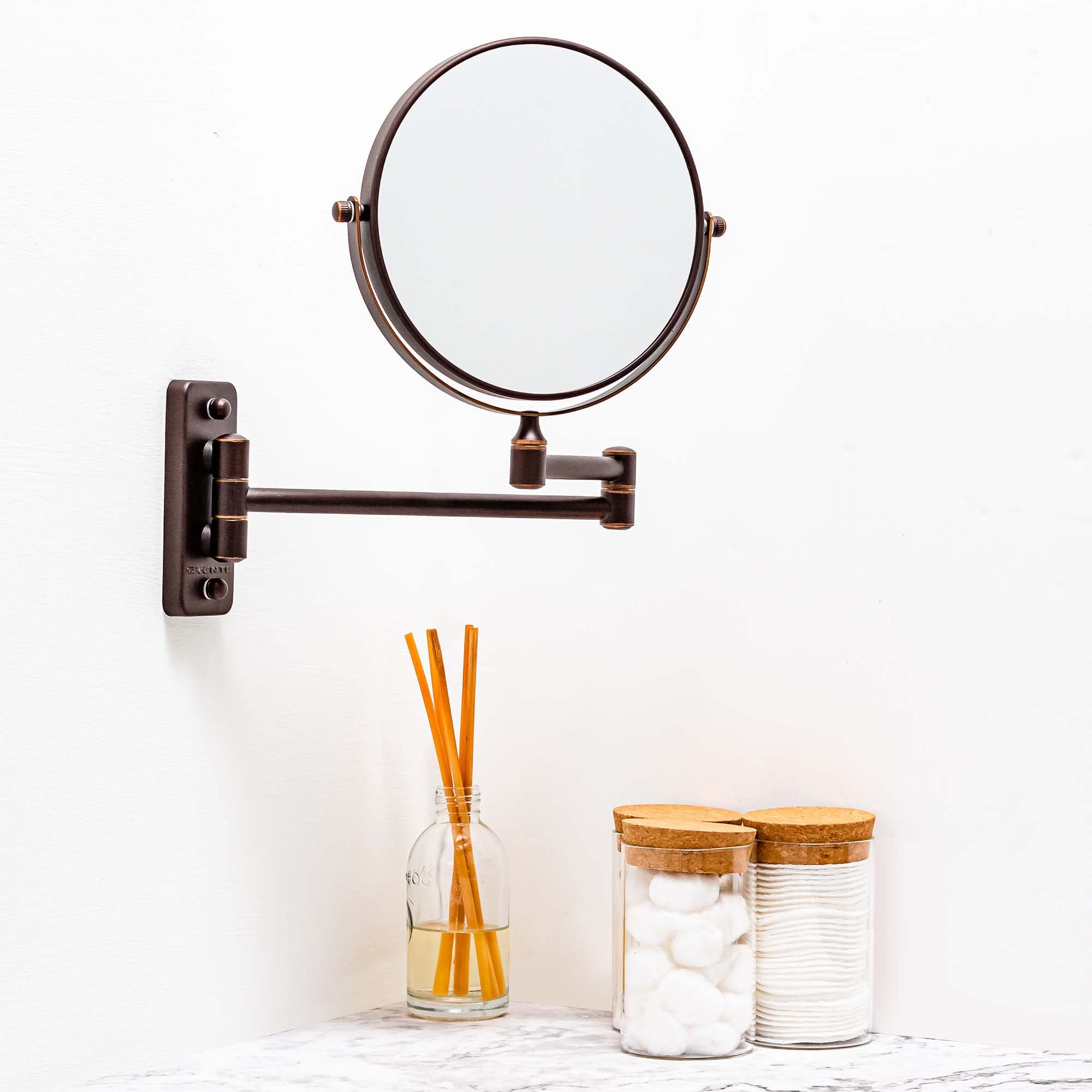 OVENTE 7" Double-Sided Wall Mounted Makeup Mirror, 1X/10X Magnification, Antique Bronze, Model MNLFW70ABZ1X10X, 360° Sw