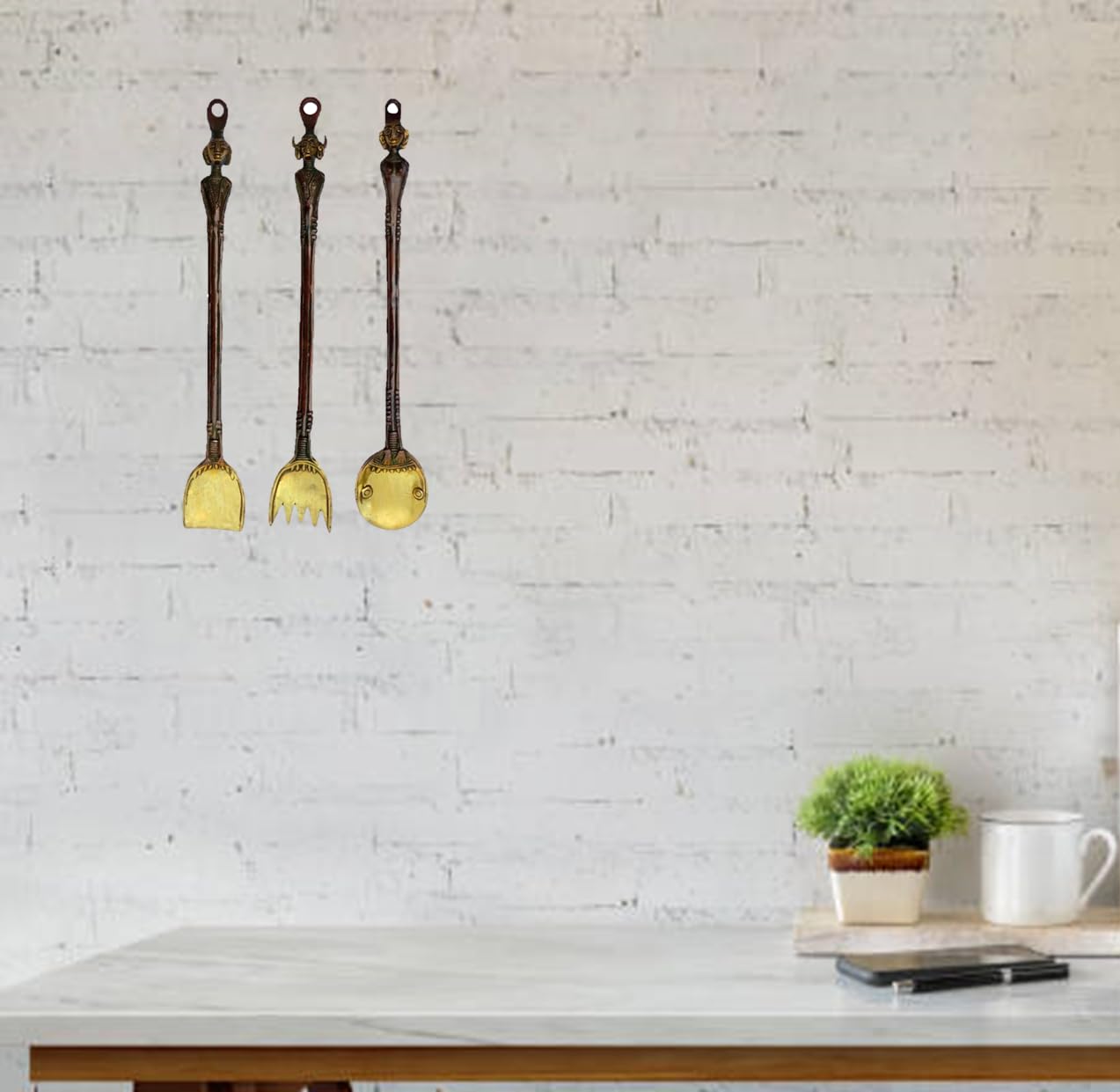 Purpledip Wall Hanging in Antique Finish Brass: Large Size Cooking Utensil/Cutlery Set (Spoon, Spatula, Fork) with Tribal Face S