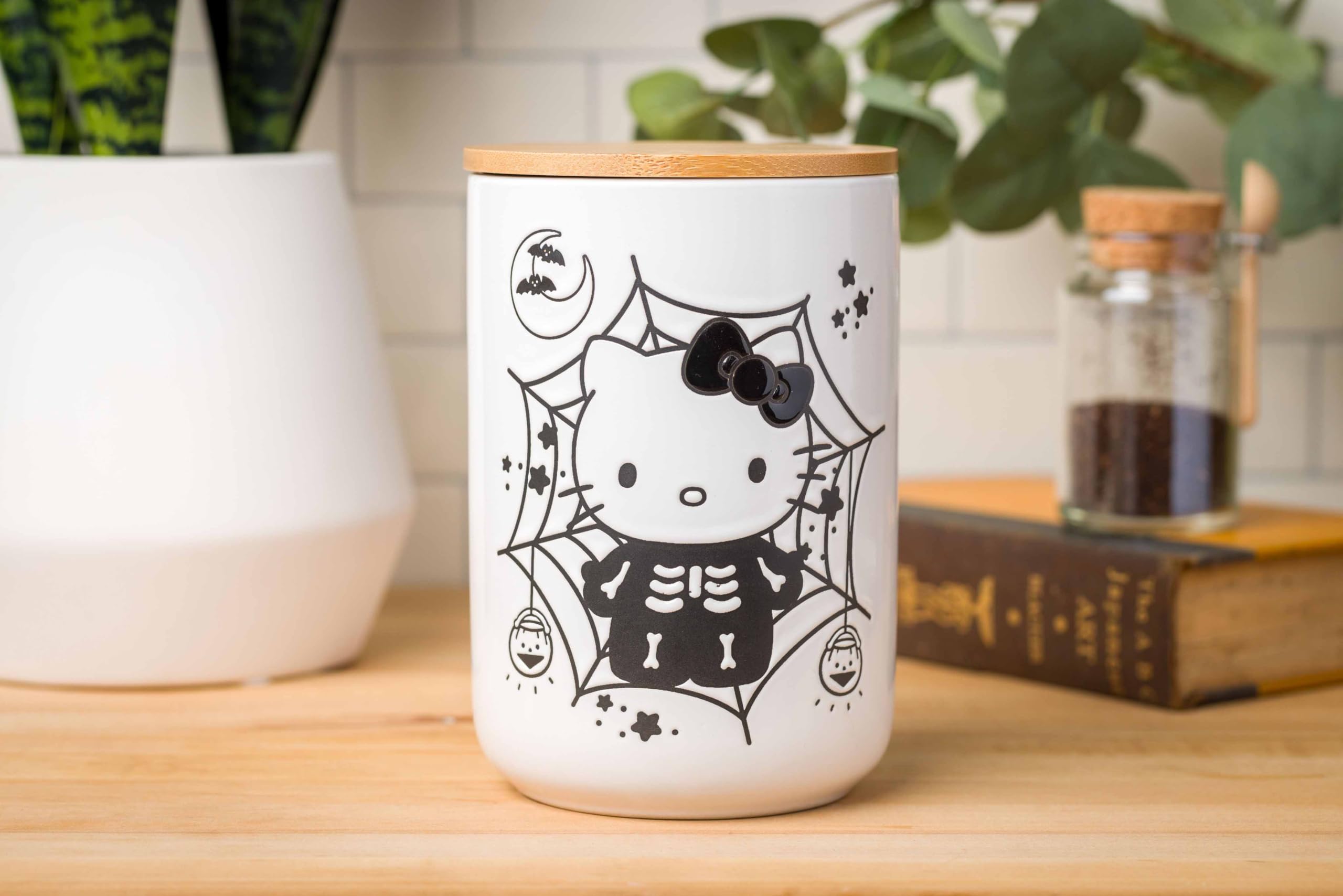 Silver Buffalo Sanrio Hello Kitty Halloween Spooky Skeleton Web Ceramic Cookie Snack Candy Jar With Airtight Bamboo Lid, Black A