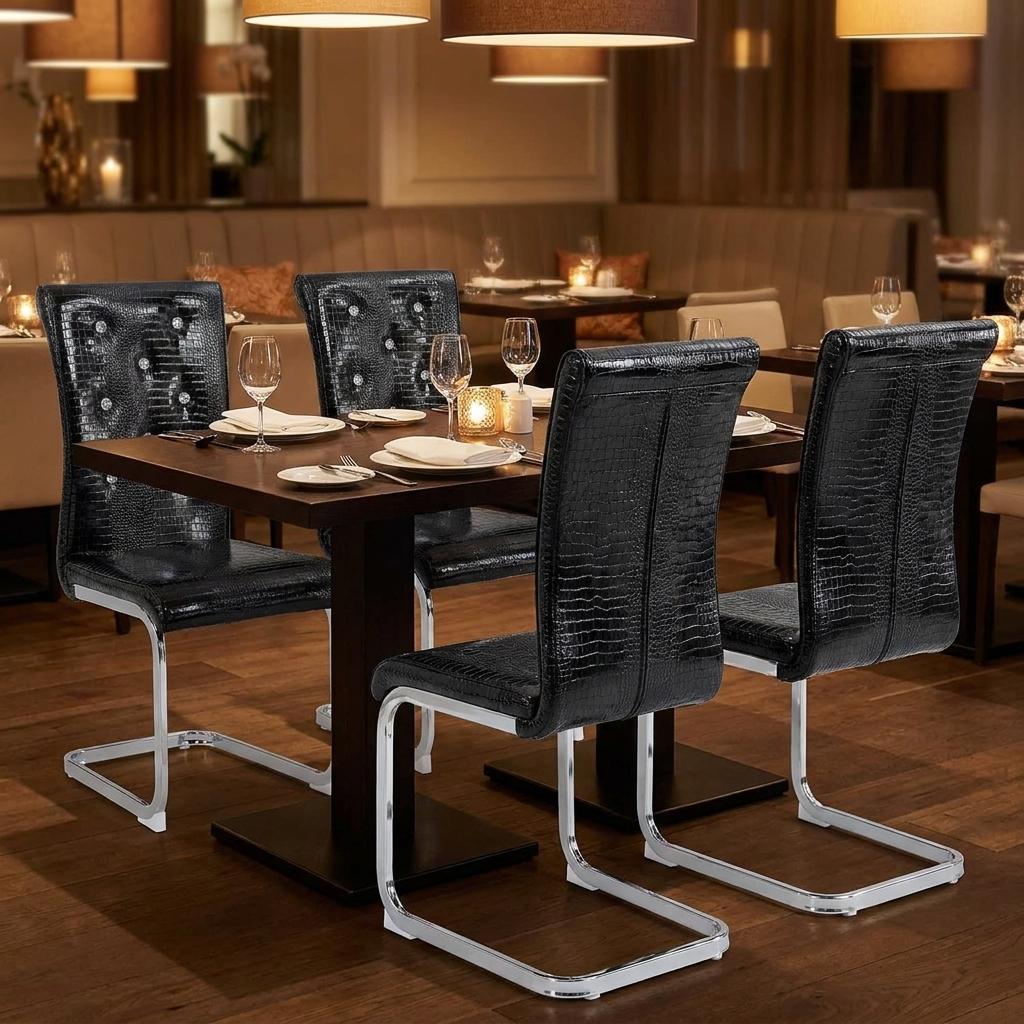 Set of Four Black And Silver Tufted Faux Leather And Metal Dining Side Chairs