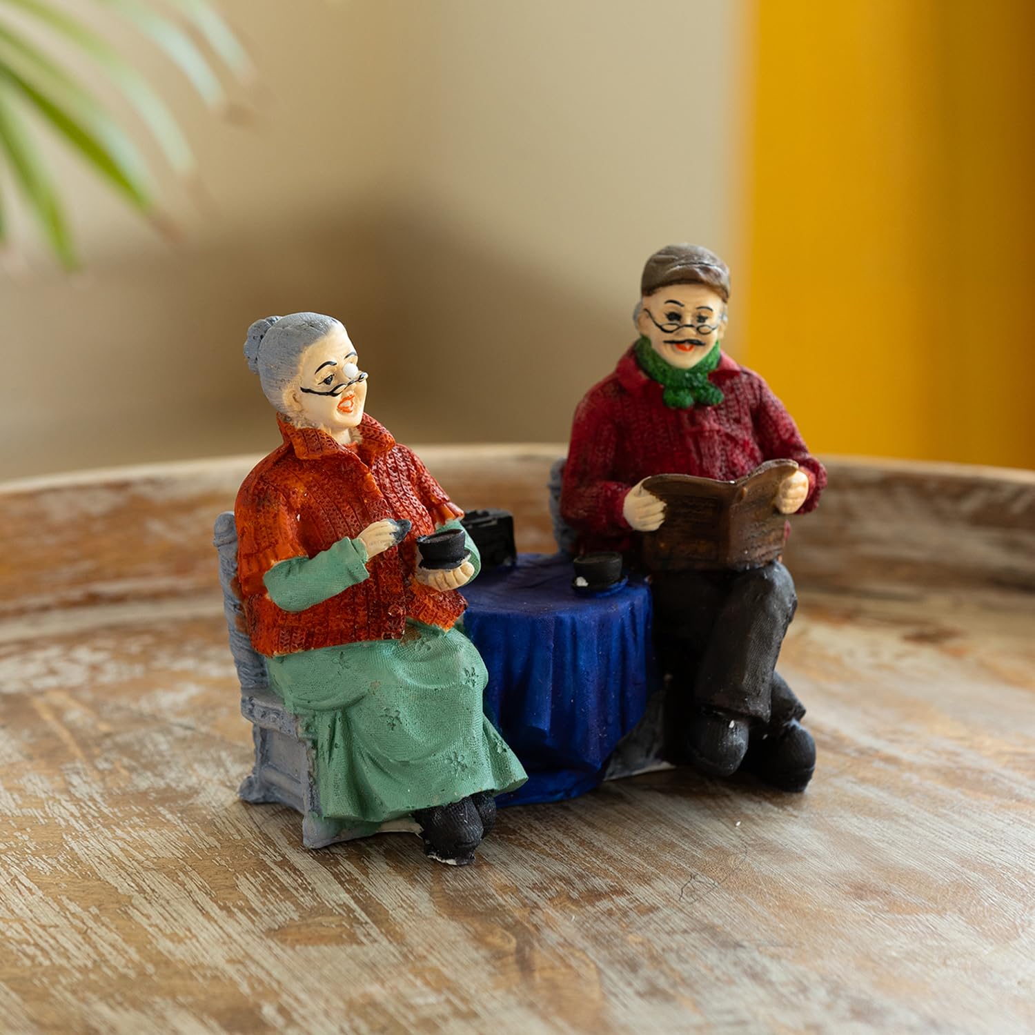 Exclusivelane Chit-Chatting Old Couple Decorative Couple Showpiece For Home Dcor (Resin, 6.7 Inch, Multicolor) | Showpiece For