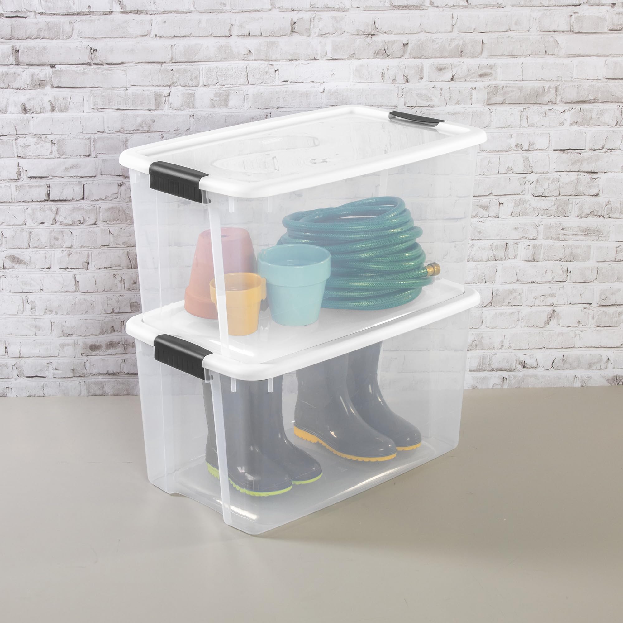 Sterilite 70 Qt Ultra Latch Box  Stackable Storage Bin with Latching Lid  Organize Clothes  Sport Gear in Basement  Clear with White Lid  4-Pack