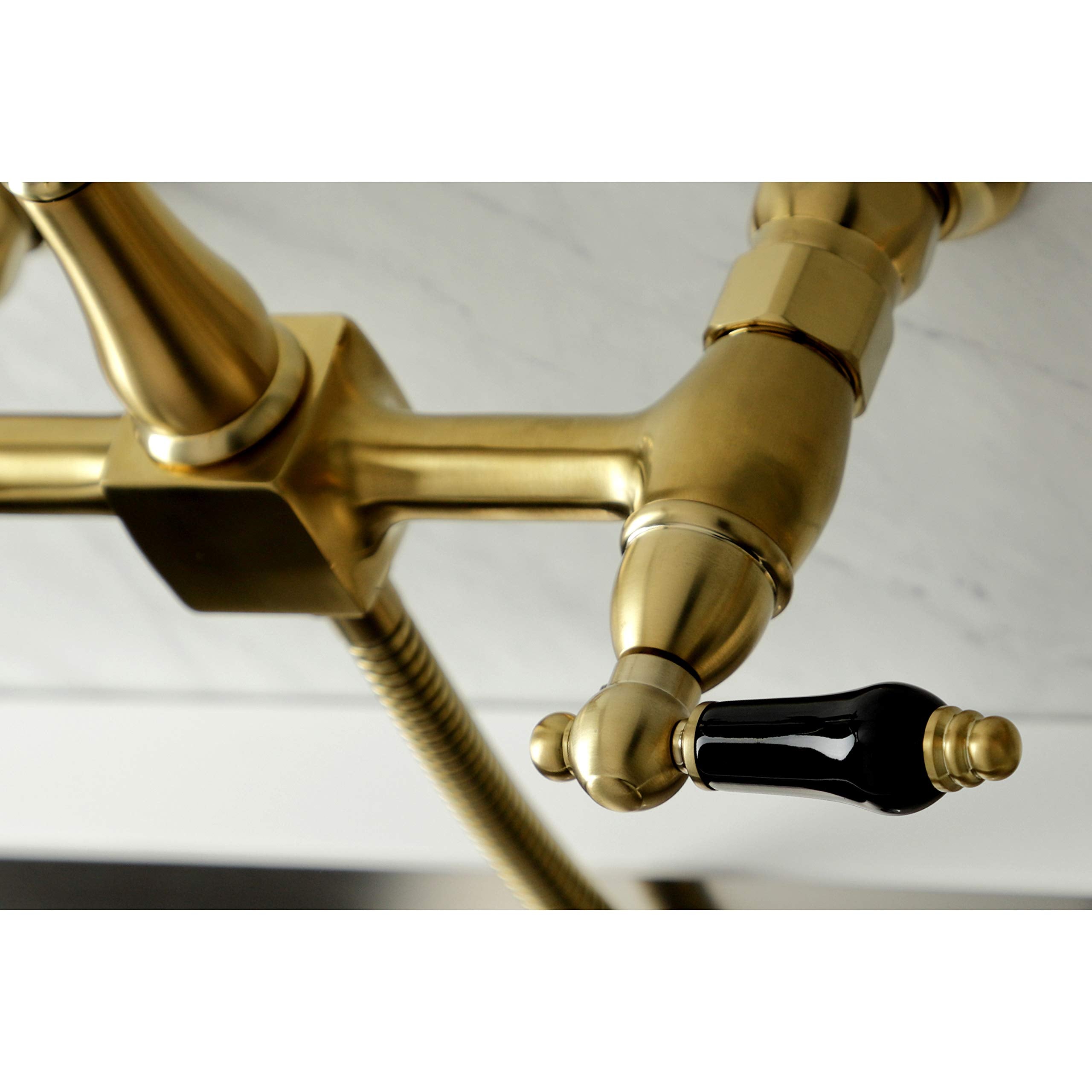 Kingston Brass KS1267PKLBS Duchess Wall Mount Bridge Kitchen Faucet with Brass Sprayer  Brushed Brass