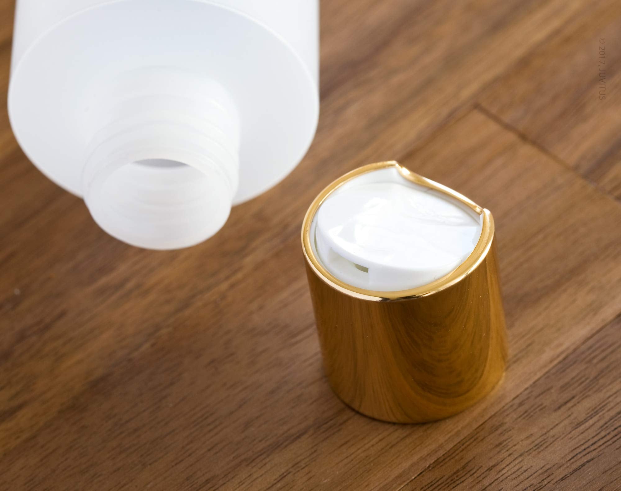 Juvitus 2 Oz Clear Natural Refillable Plastic Squeeze Bottle With Gold Metal Disc Cap Top - (12 Pack)