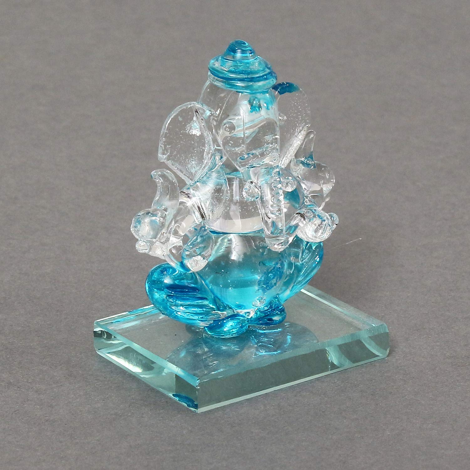 Ecraftindia Skyblue And Transparent Double Sided Crystal Car Ganesha Showpiece