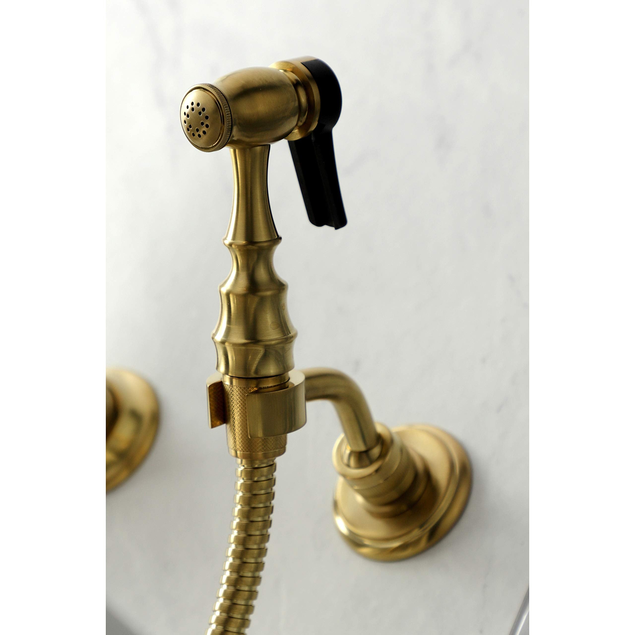 Kingston Brass KS1267PKLBS Duchess Wall Mount Bridge Kitchen Faucet with Brass Sprayer  Brushed Brass