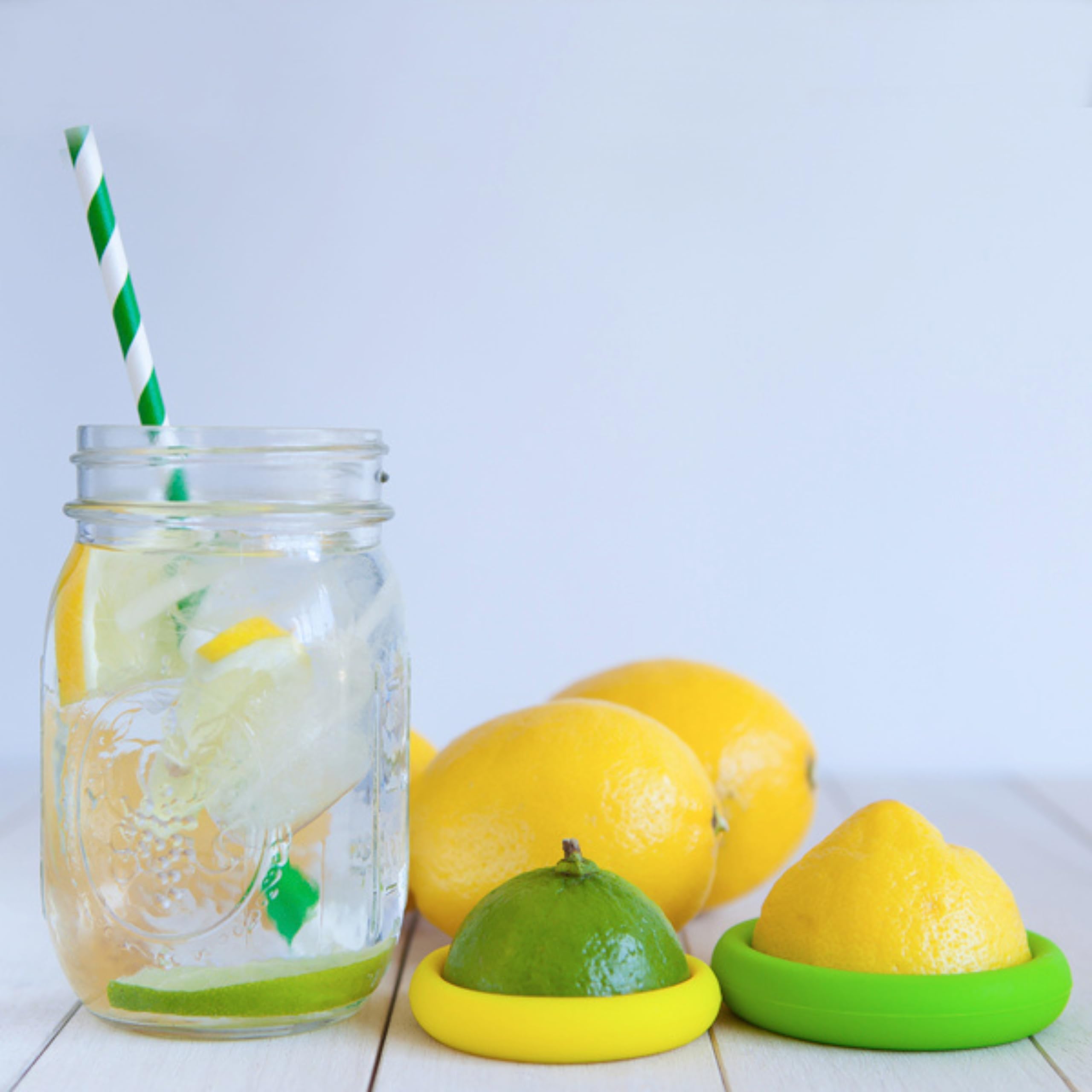 Food Huggers Set Of 2 Reusable Silicone Food Savers - Small Sizes - Patented Product - Green And Yellow