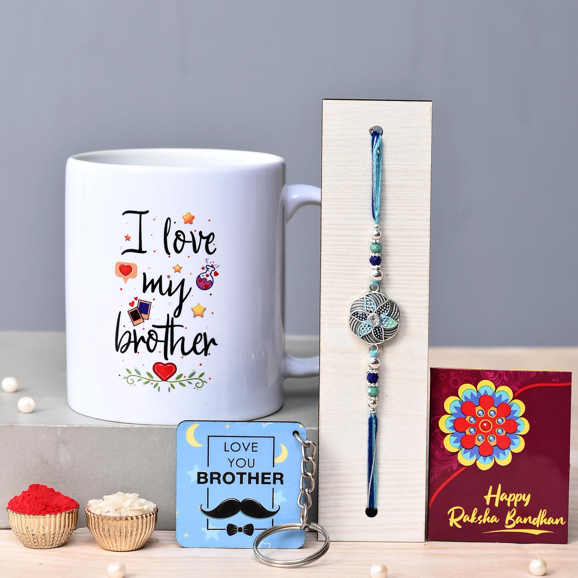 TONKWALAS Rakhi for Brother with Printed Ceramic Mug and Keychain Combo |Pack of 5 (Greeting Card, Roli Chawal, Rakhi, Printed M