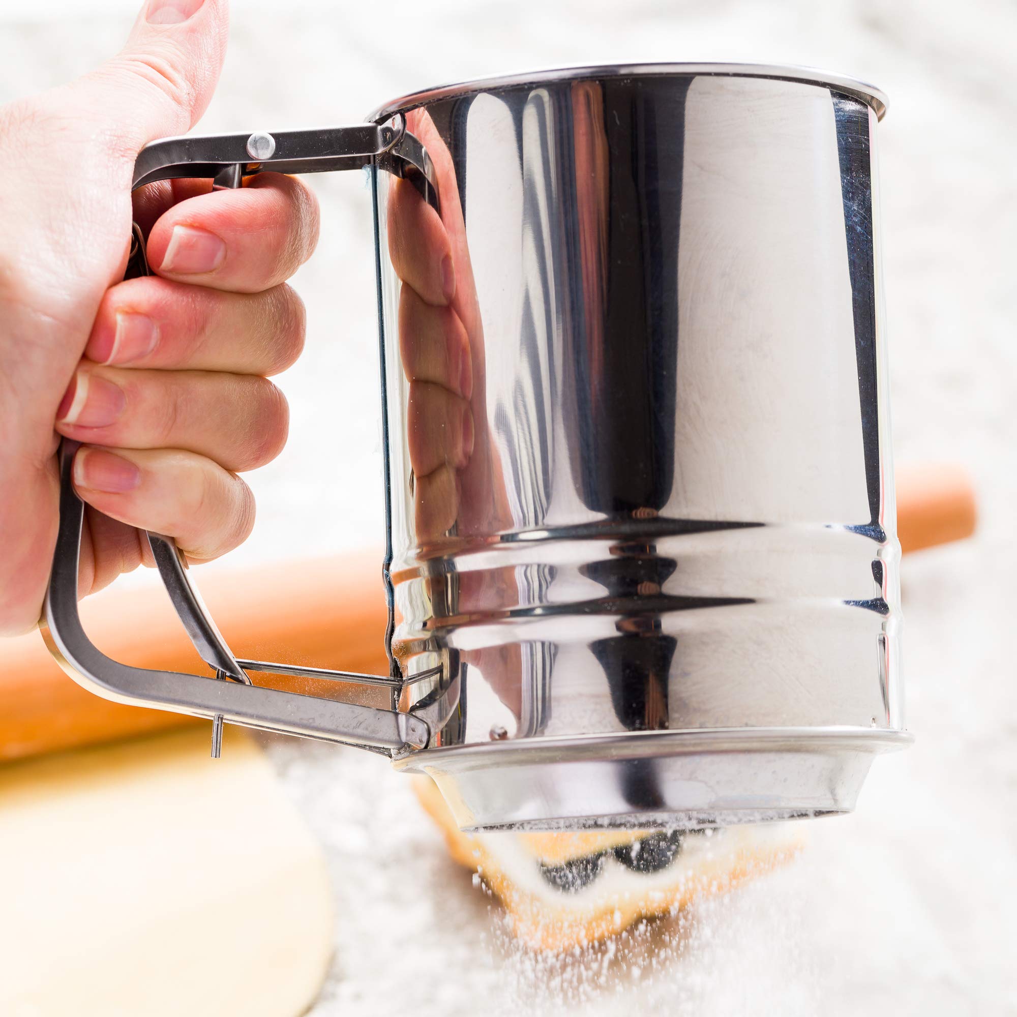 Restaurantware Pastry Tek 2.5 Cup Flour Sifter 1 Corrosion-Tolerant Baking Sifter - Squeeze Handle Triple Mesh Screen Stainless