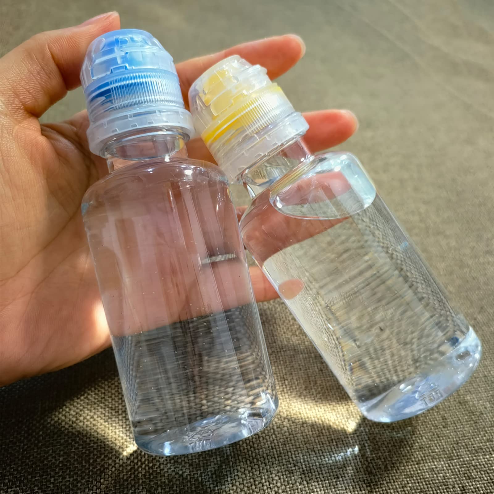 Hymaome 4Pcs Plastic Honey Squeeze Bottle Travel Condiment Dispenser Flip Top Reusable/Refillable/Leakproof Little To-Go Contain