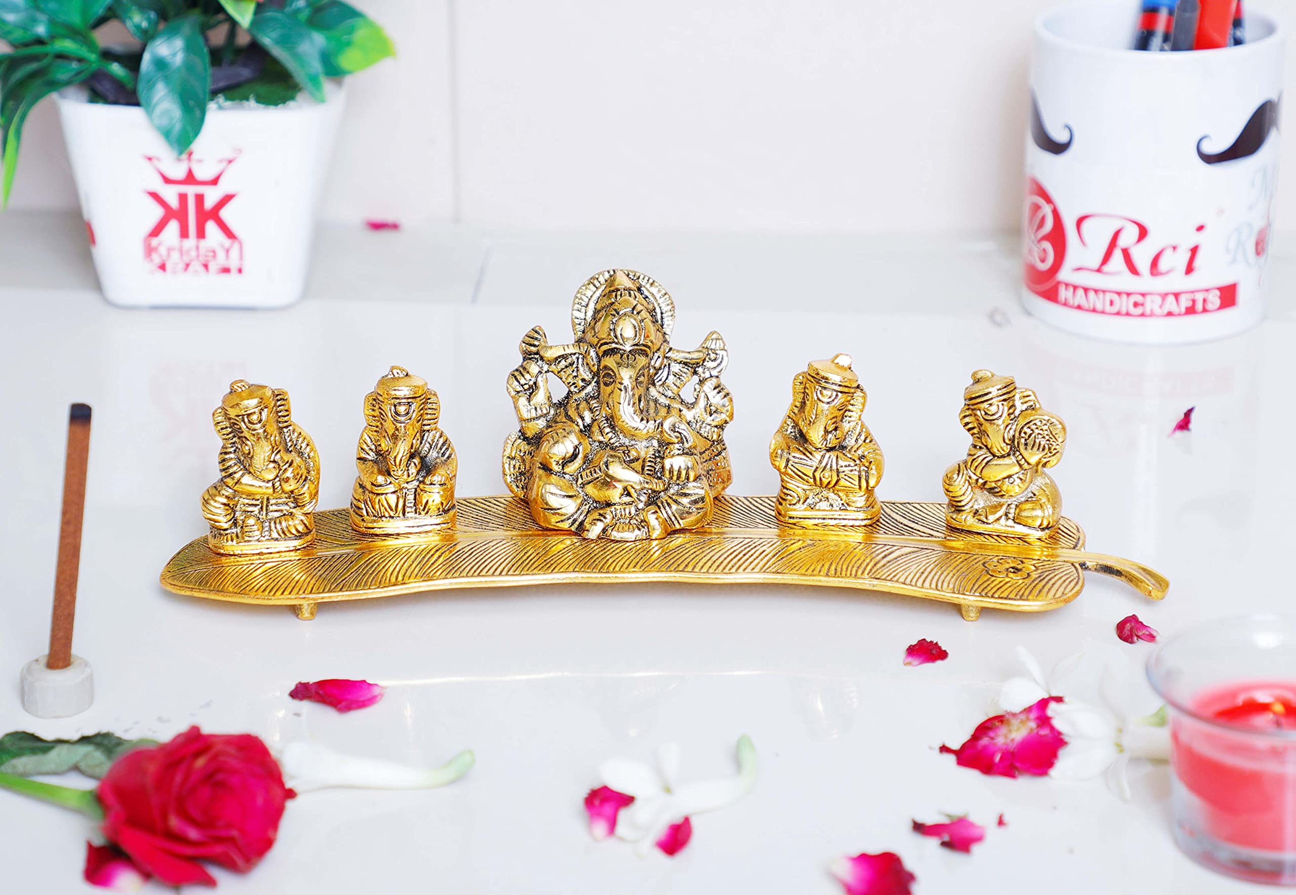 Kridaykraft White Metal Gold Plated Ganesha On Leaf With Musical Instrument Metal Statue For Pooja,Home & Office Dcor Ganesha Mu