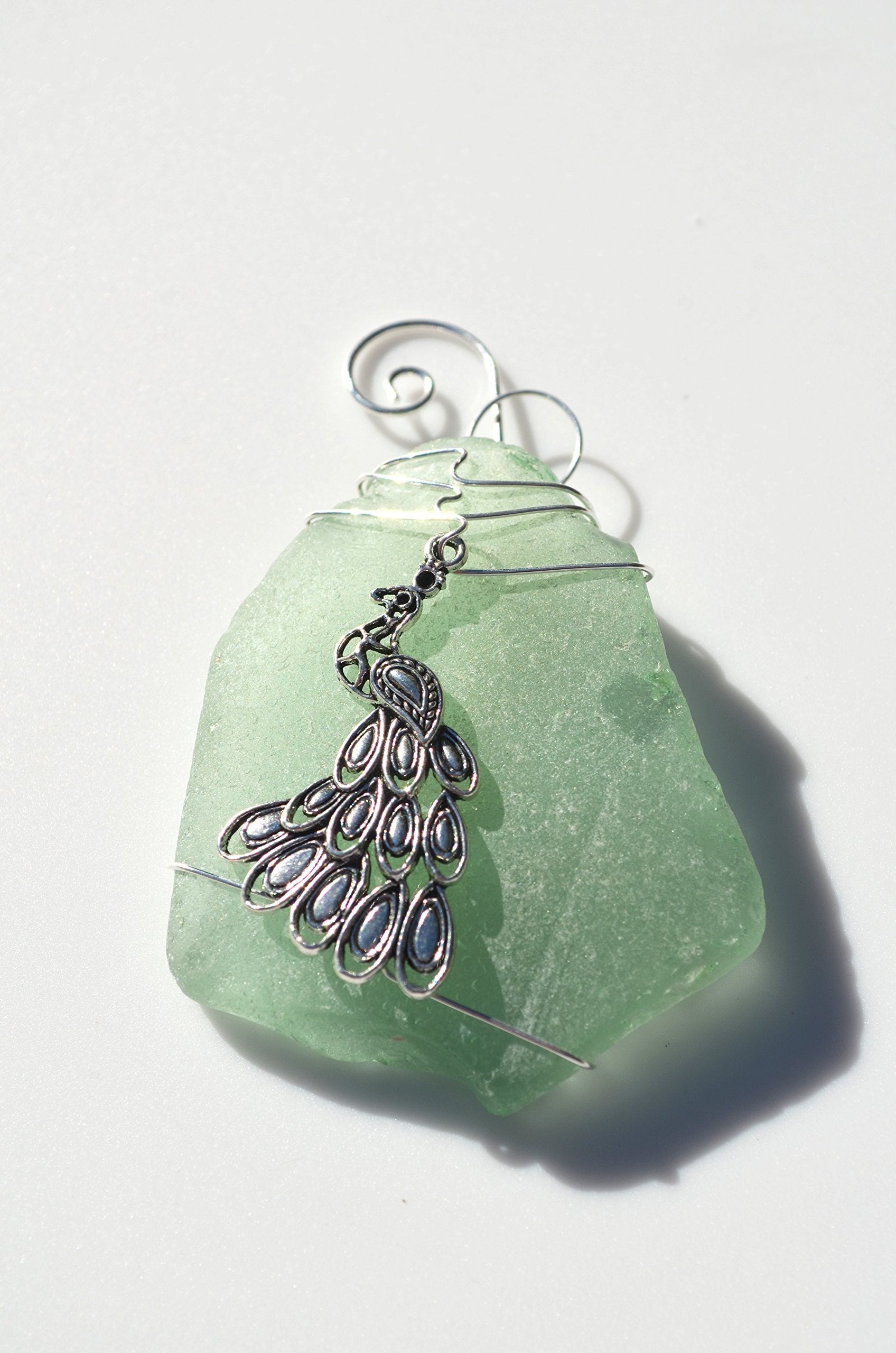 DejaVu Designs Silver Peacock Charm on a Genuine Sea Foam Sea Glass Ornament - Made to Order