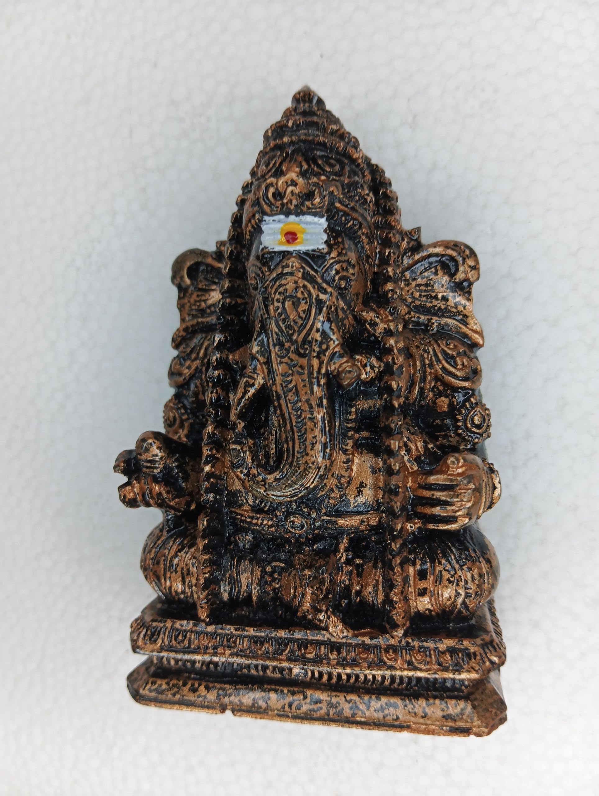 Heena Home Decor Pillayarpatti/Karpaga Vinayaga/Ganesh/Vinyagar Copper Color Polystone Idol 9 Cm Height