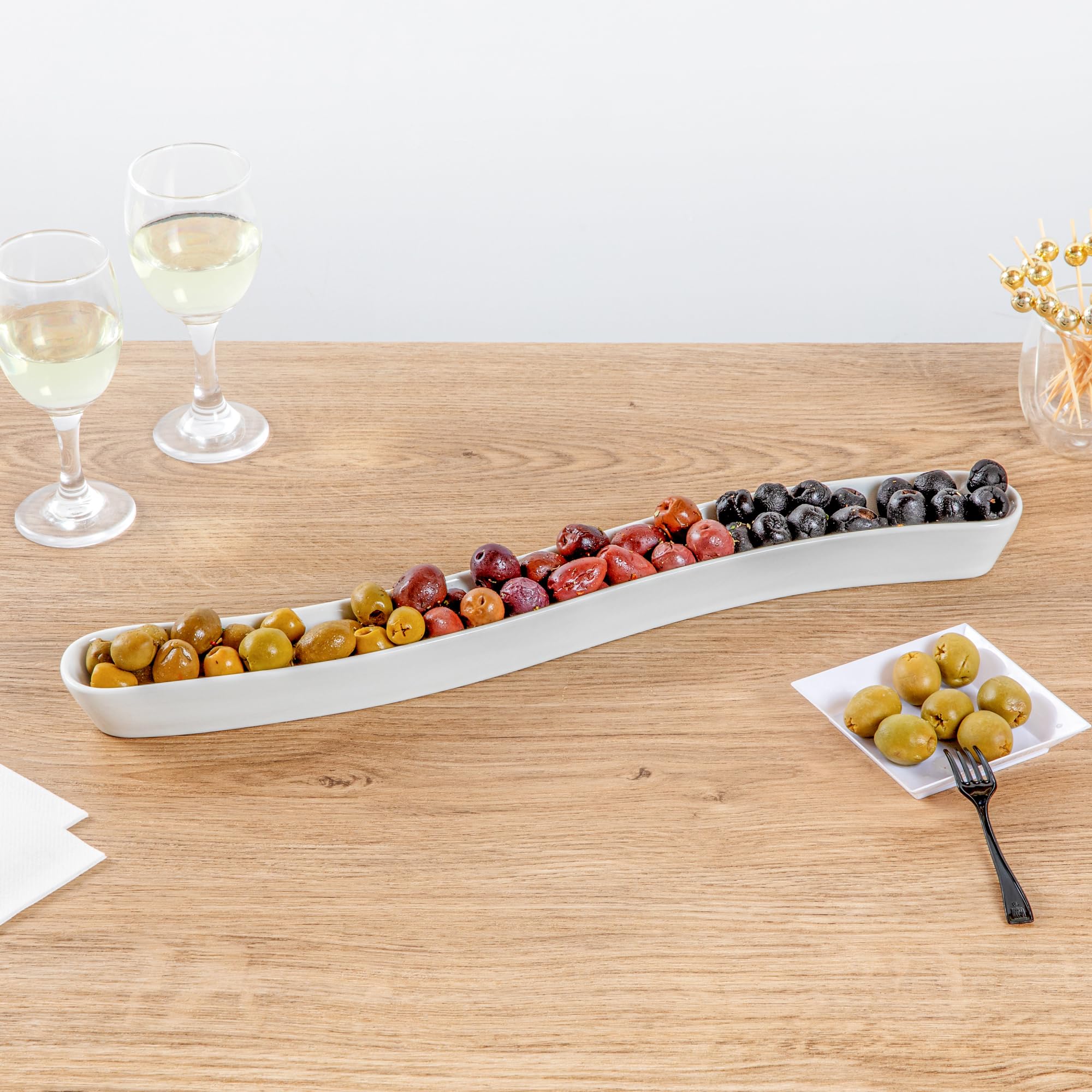 Restaurantware Swerve 14 Ounce Olive Plate 1 Curved Olive Tray - Small Chip Resistant White Porcelain Olive Canoe Dishwasher Saf