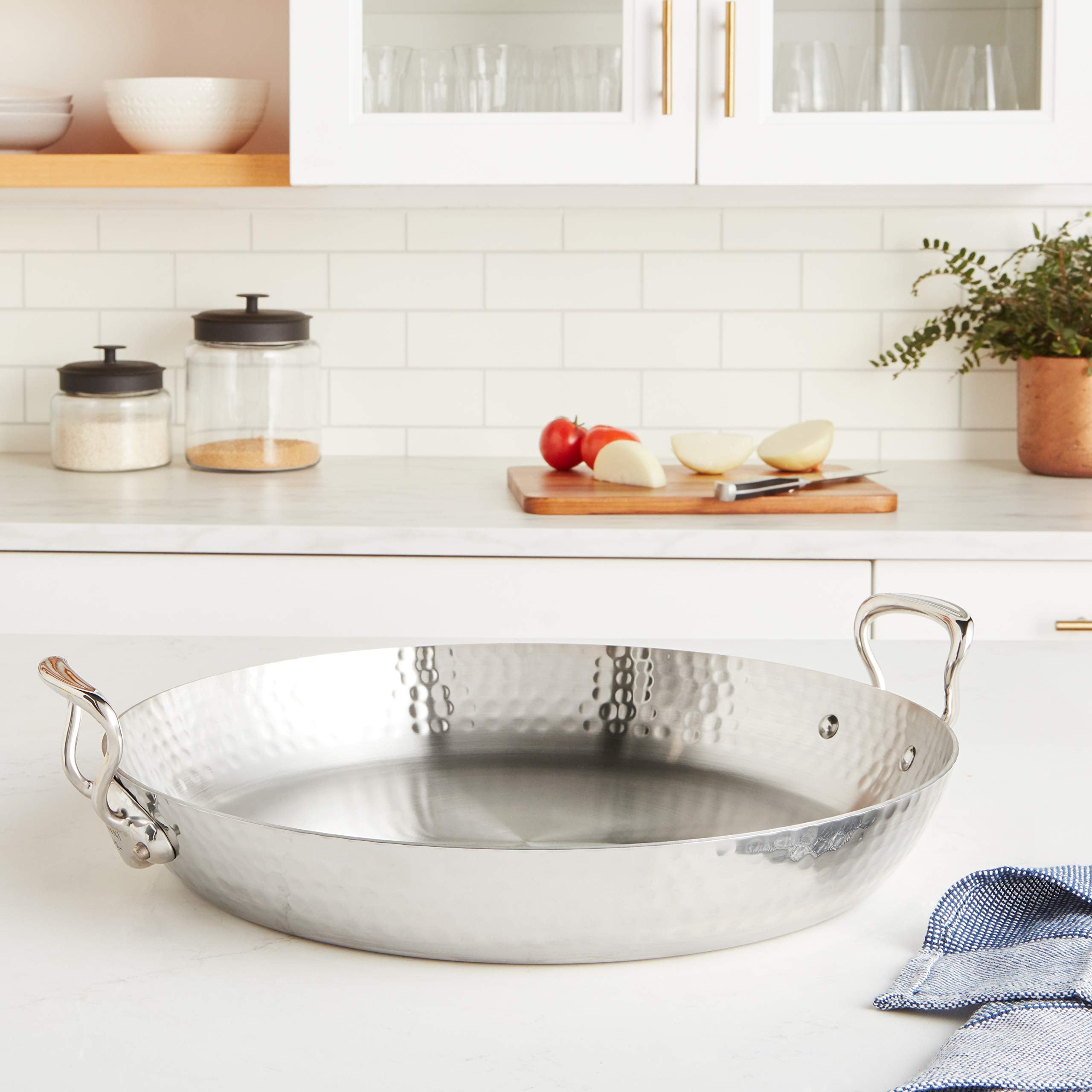 Mauviel M'Elite 5-Ply Hammered Polished Stainless Steel Paella Pan With Cast Stainless Steel Handles, 15.7-In, Made In France