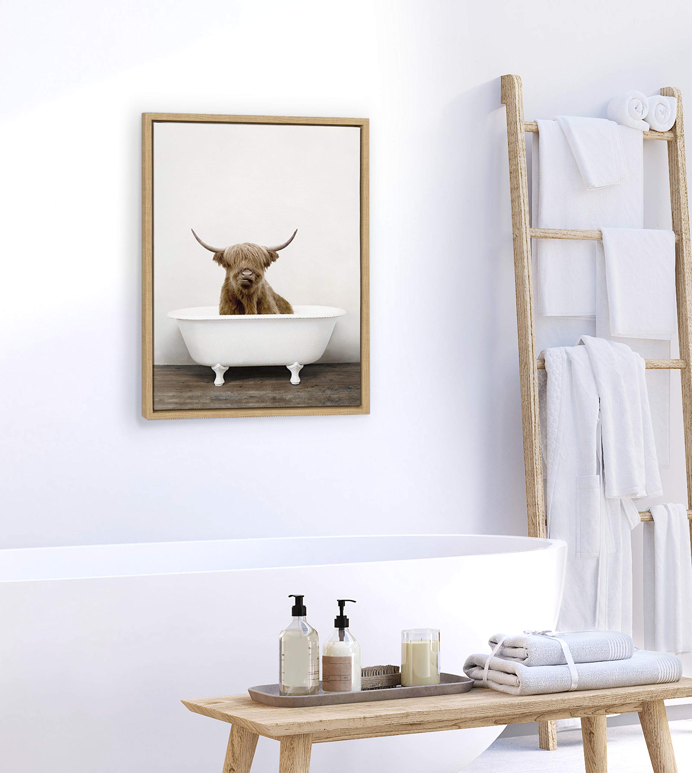 Kate and Laurel Sylvie Highland Cow in Tub Color Framed Canvas Wall Art by Amy Peterson  18x24 Natural  Chic Animal Art for Wall