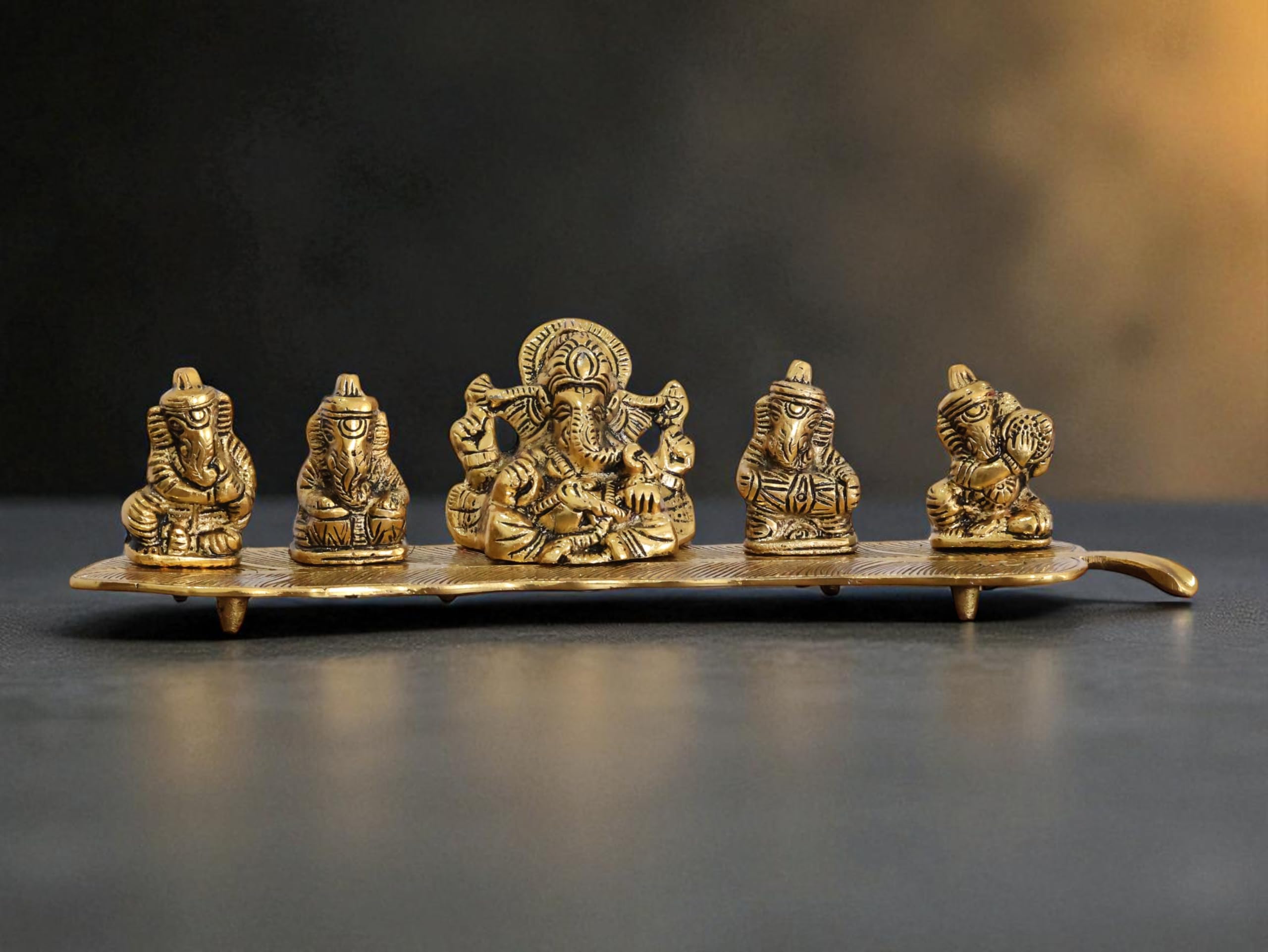 Kridaykraft White Metal Gold Plated Ganesha On Leaf With Musical Instrument Metal Statue For Pooja,Home & Office Dcor Ganesha Mu