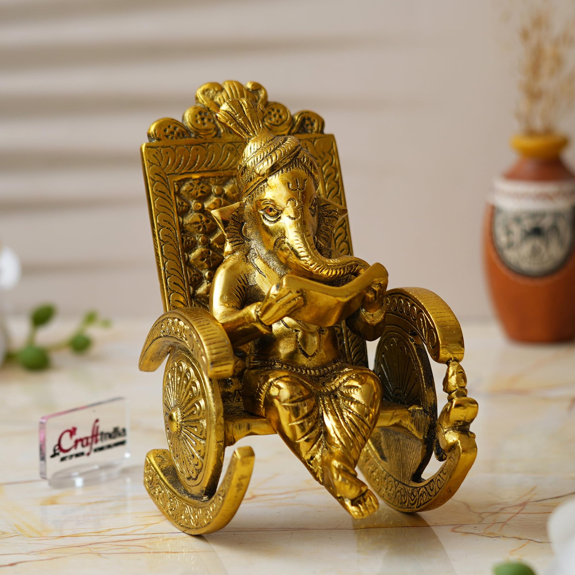 Ecraftindia Golden Metal Handcrafted Lord Ganesha Idol Reading Book On Rocking Chair - God Idol For Home Decor, Office Desk, And