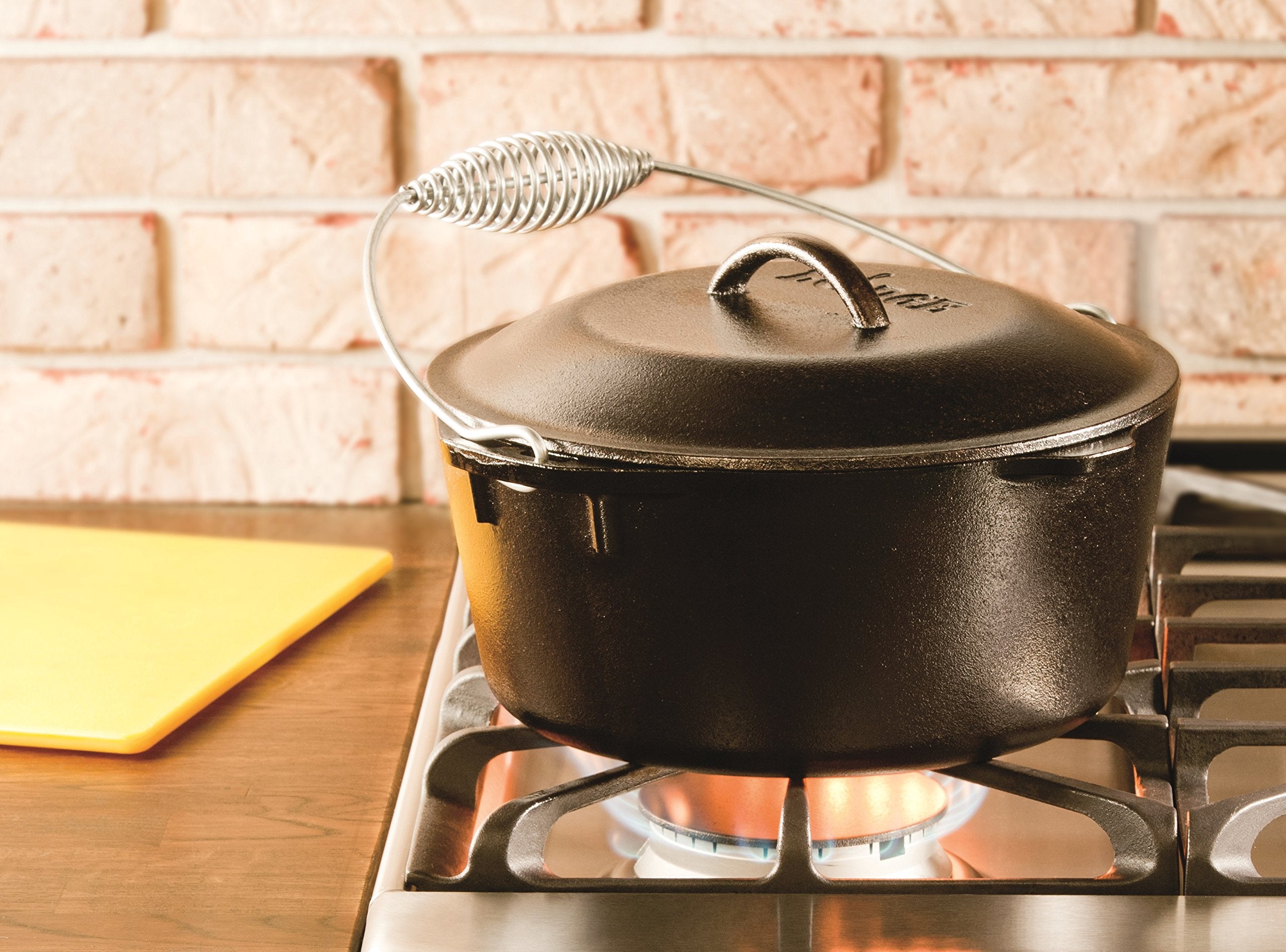 Lodge 5 Quart Pre-Seasoned Cast Iron Dutch Oven With Lid - Wire Bail Handle For Easy Transfer From Cooking Surface To Table - Us