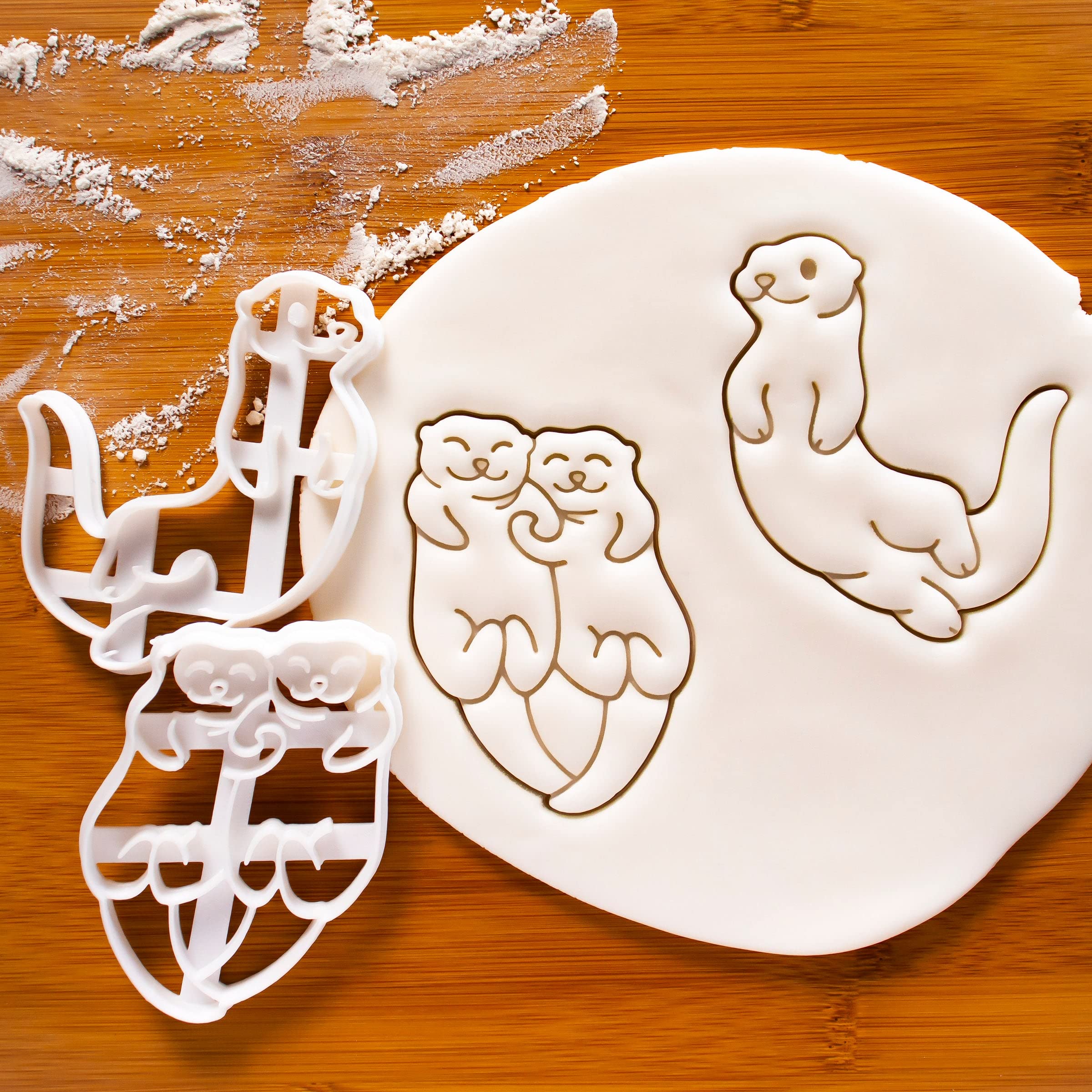 Set Of 2 Otter Cookie Cutters (Design: Swimming Sea Otter And Otter Holding Hands), 2 Pieces - Bakerlogy