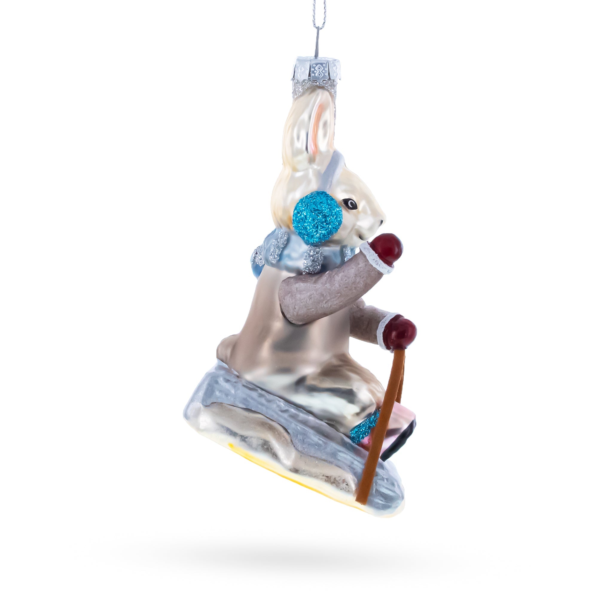 Bunny Sledding with Earmuffs Glass Christmas Ornament