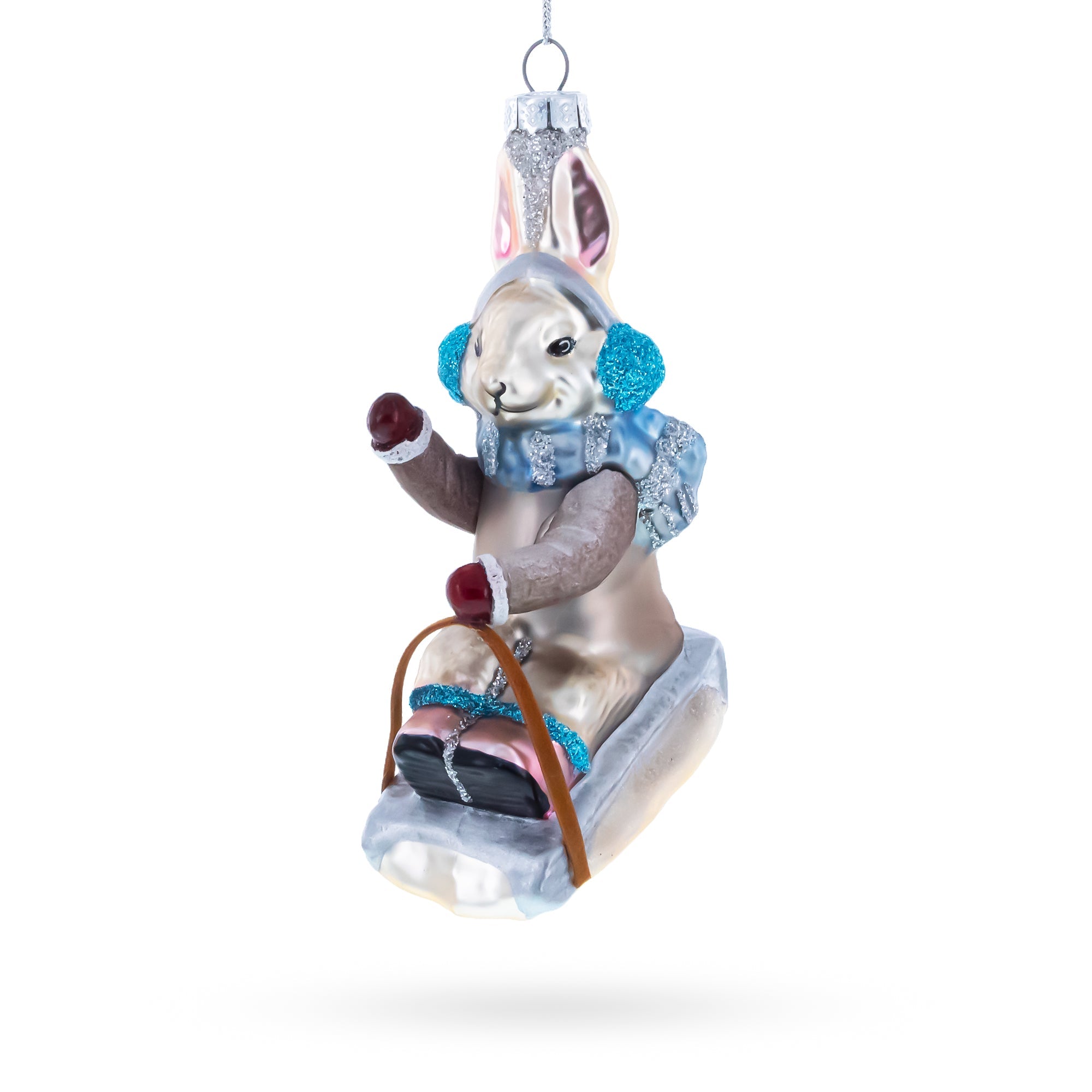 Bunny Sledding with Earmuffs Glass Christmas Ornament