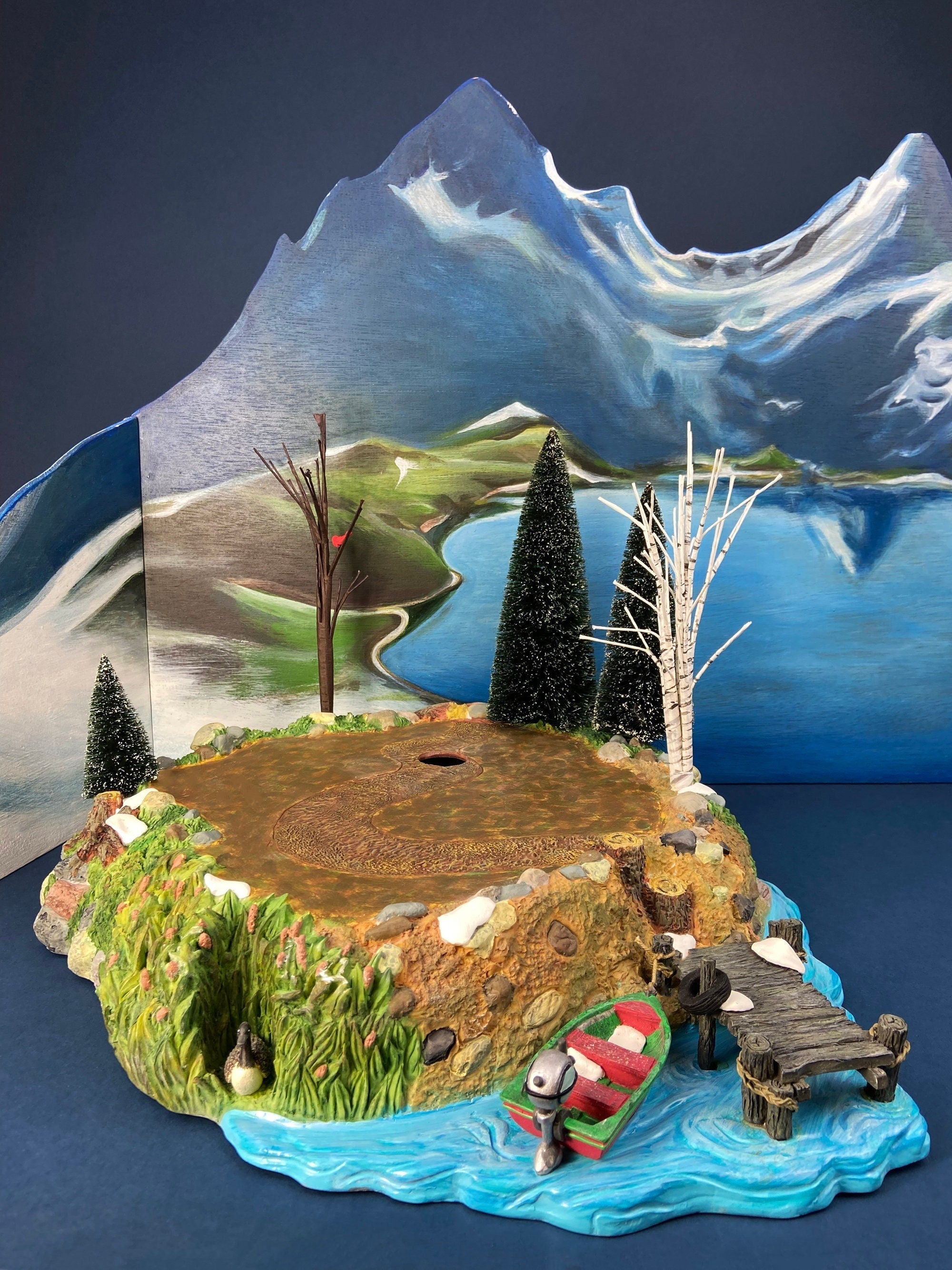 Christmas Village Platform by Department 56. Sounds of the North Woods. Christmas Village Accessories: Platform, 2 Pines, and 2 Naked Trees