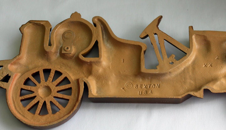 Antique Cast Metal Yellow Car.  Wall Hanging Rustic Home Decoration.  Ready to Hang. Made by Sexton, USA.