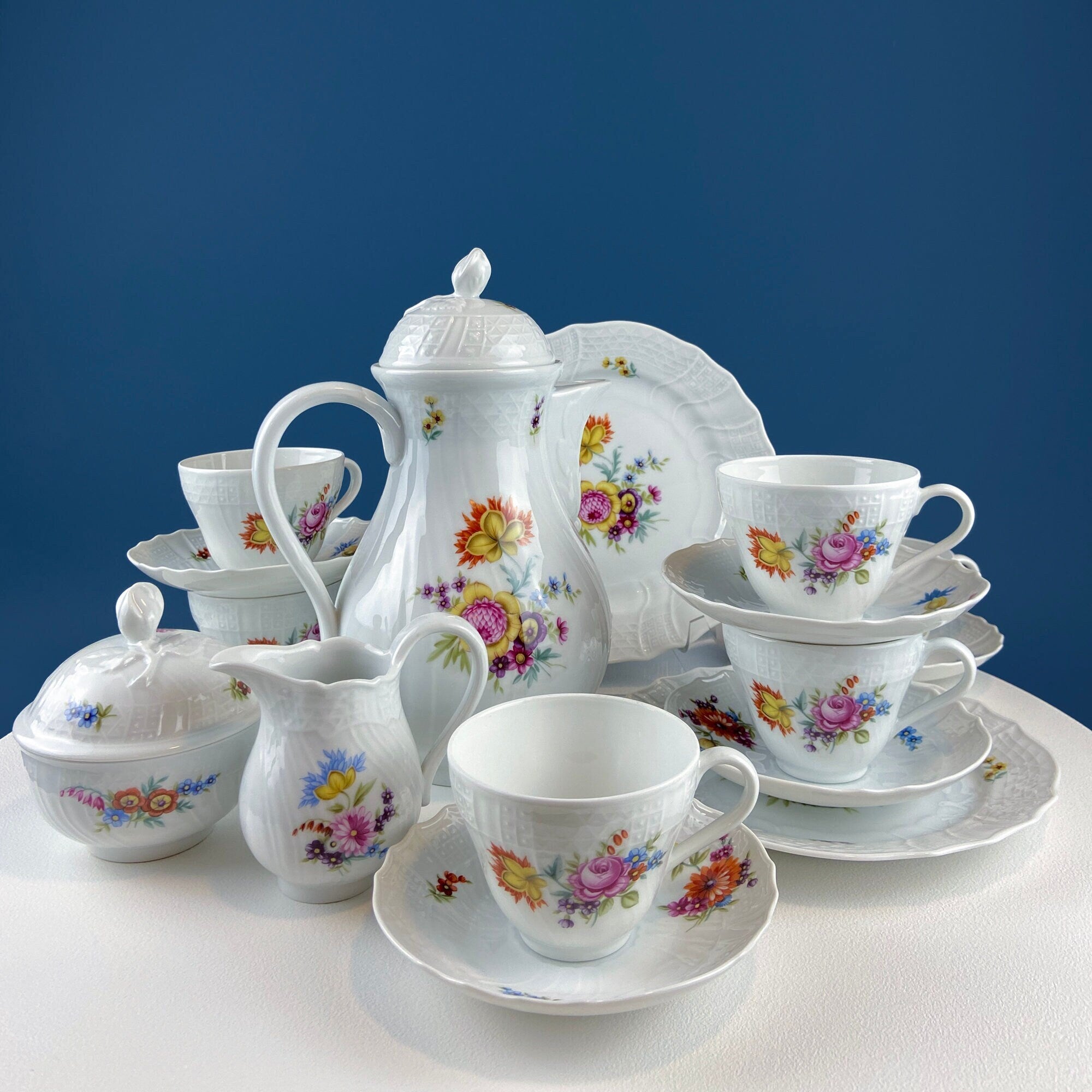 Antique Hutschenreuther Porcelain Coffee Set. Coffee or Teapot, Sugar Jar, Creamer, 2 8" Dessert Plates, & 6 Tea Cups/Saucers. Floral Motif.