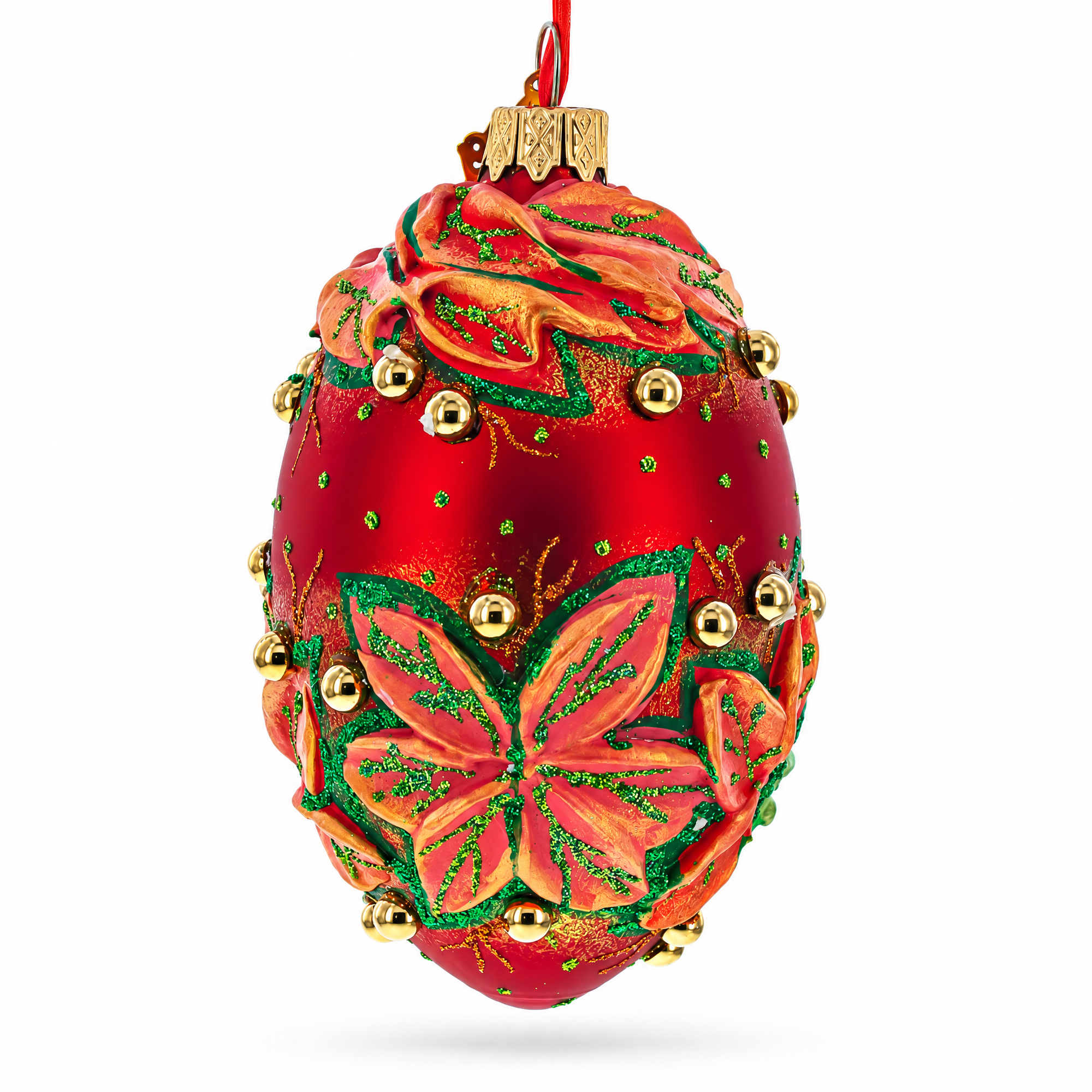 Red and Green Leaves on Red Glass Egg Ornament 4 Inches